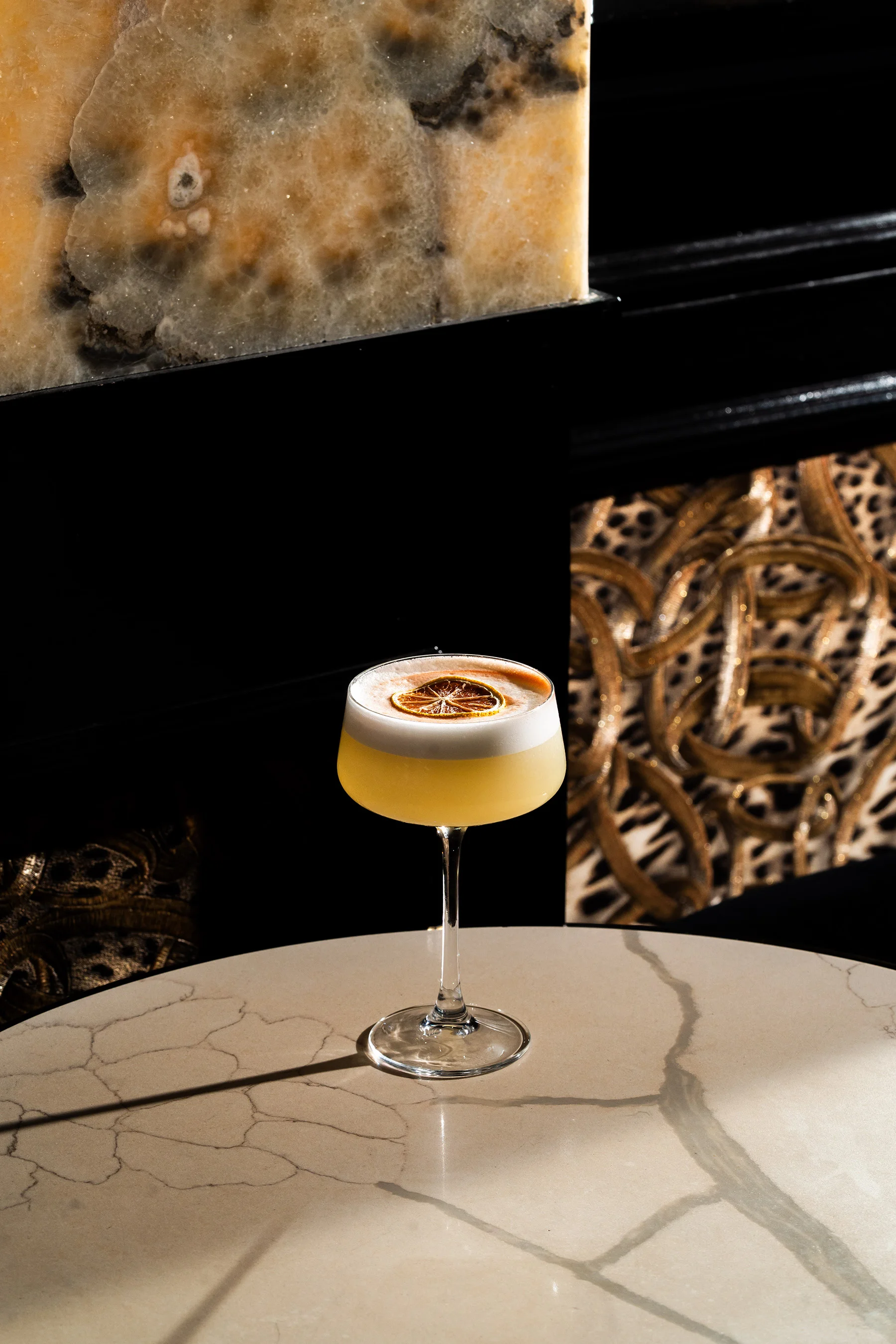 Cocktail by fireplace