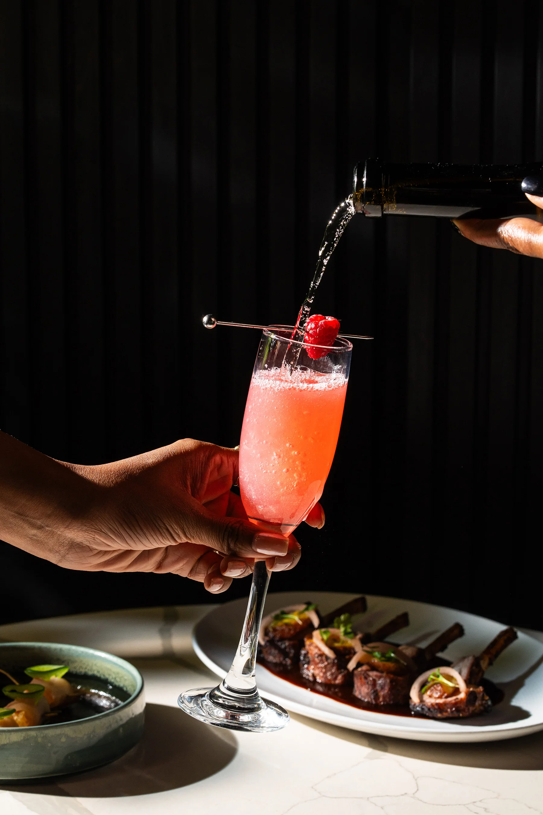 Champagne pour with lamb chops