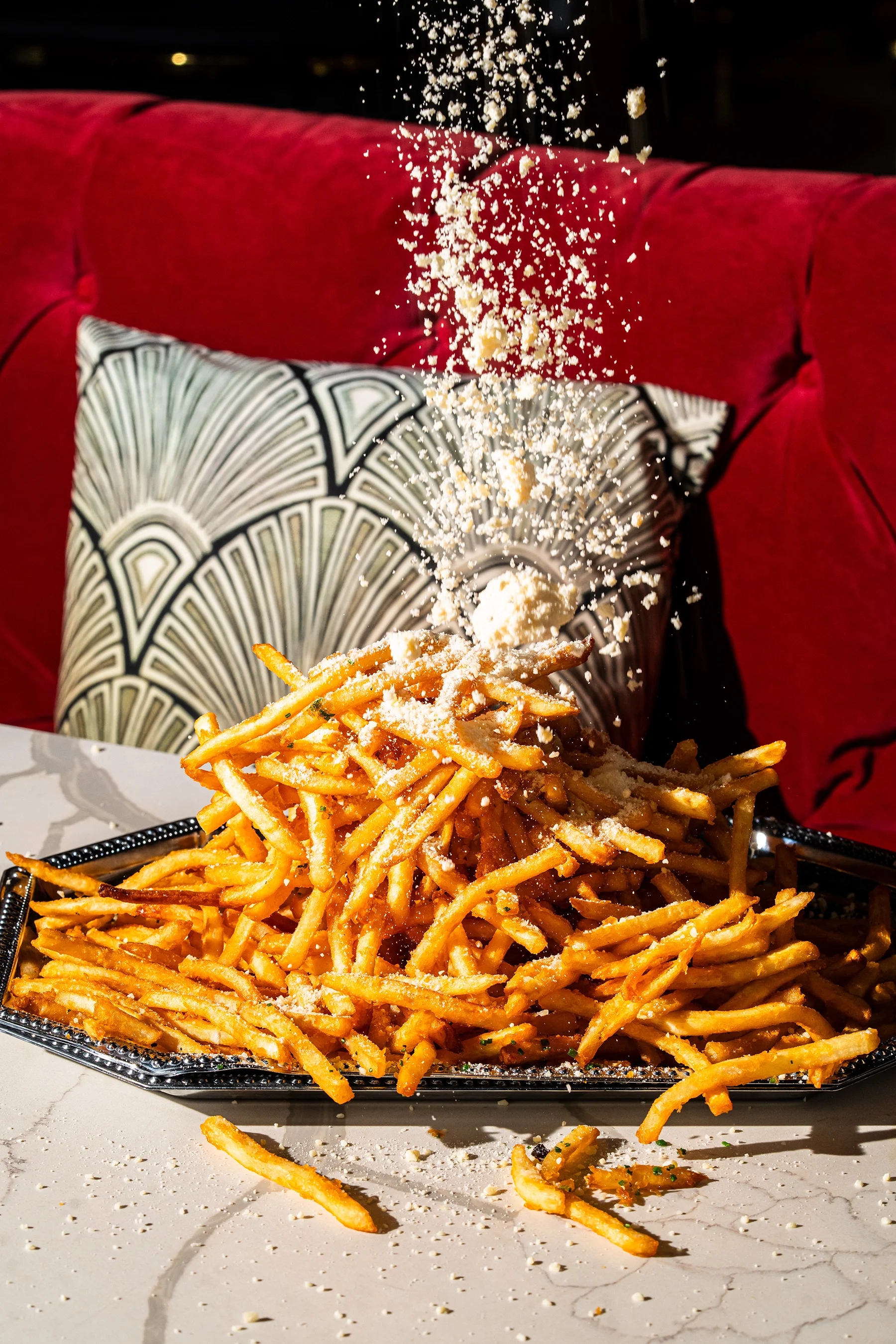 Truffle parmesan fries with Art Deco pillow